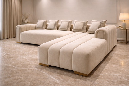 Beige sectional sofa in a modern living room setting with neutral decor.